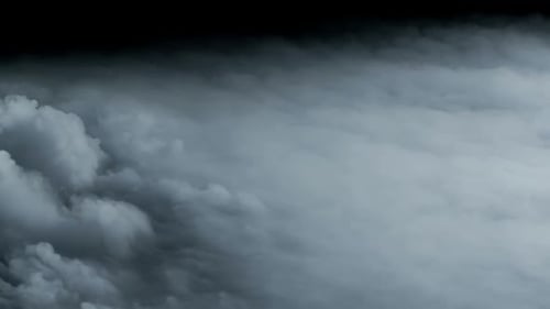 Abstract Gray Smoke Moving on Dark Background