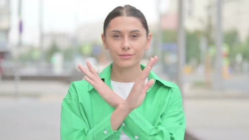 Woman Saying No With Crossed Arms Outside