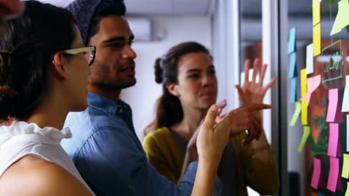 Smiling Team Collaborates in Modern Office