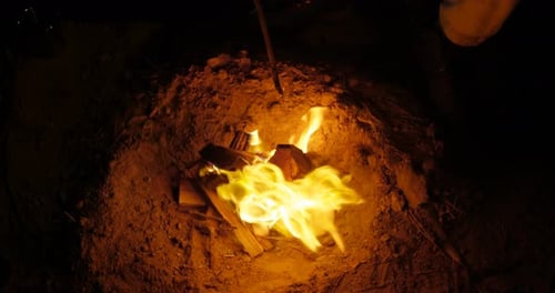 Man Cooking Food on Campfire in The Forest 4k