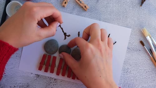 Making Diy Merry Christmas Deer on Greeting Card Postcard Made of Pebbles Sea Stones Clothespins and