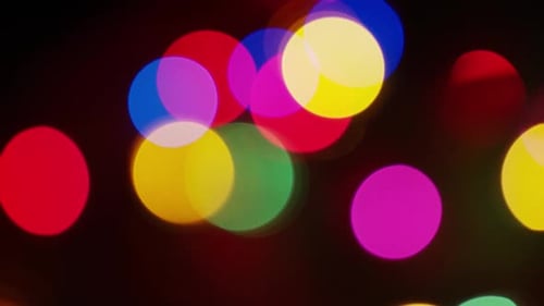 Abstract Flickering Colorful Bokeh Lights on Black