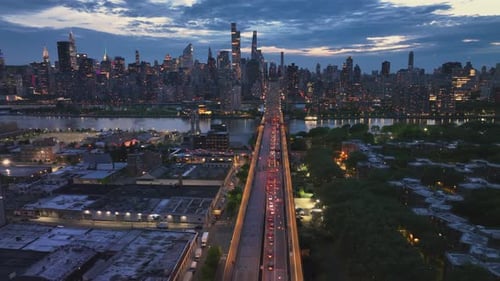 East River Amidst Buildings in City Drone Flying Backward From Skyline