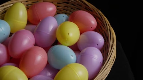 Pastel Easter Eggs in Basket Close Up