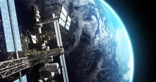 Artificial Satellite Flying Over Earth