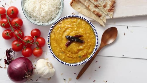 Indian Popular Food Dal Fry or Traditional Dal Tadka Curry Served in Bowl