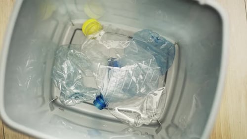 Recycling Bin with Empty Plastic Water Bottles