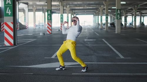 Contemporary Street Dancer Man Funky Urban Is Dancing Freestyle in the City. Slow Motion