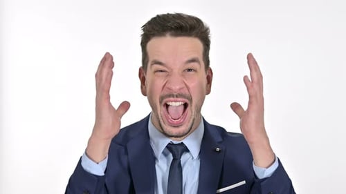 Frustrated Businessman Yelling and Raising Hands in Anger
