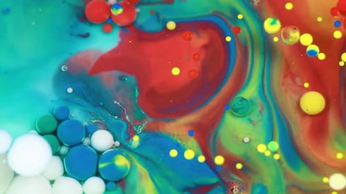 Abstract Multicolored Bubbles Paint. Slow Motion. Top View