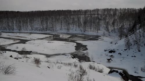 Video of a Winter Mountain Landscape a Mountain River in Clear Weather