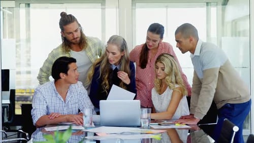 Business Team Collaborates in Bright Modern Office