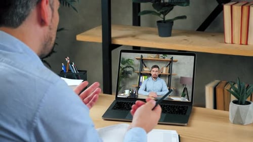 Businessman at Home Office Tells Manager Online Video Call Webcam Chat Laptop