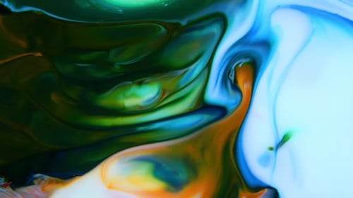 Abstract Liquid Paints Swirling Close-Up