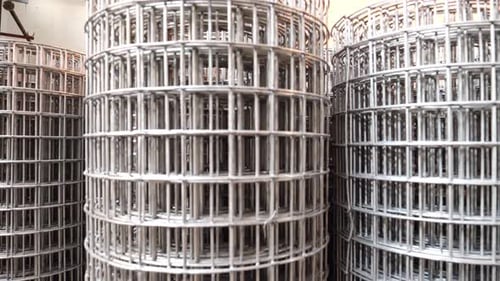 Rolls of Metal Wire Mesh in a Warehouse