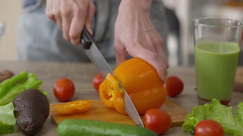 Vegetables Being Sliced in Kitchen for Healthy Eating