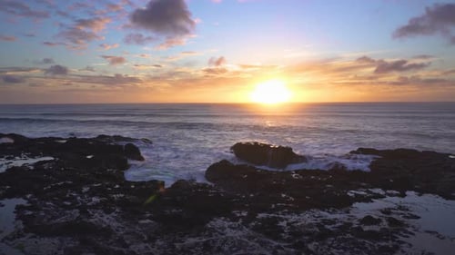 Sunset over Ocean Coast in Summer Evening New Zealand