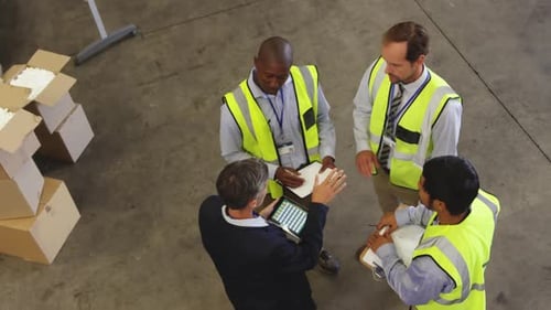 Staff meeting on the warehouse floor 4k