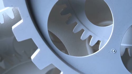 White Gears Turning in Close Up