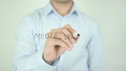 Man Writes Media Server With Marker on Glass