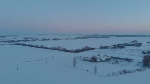 Snow Field At Sunset