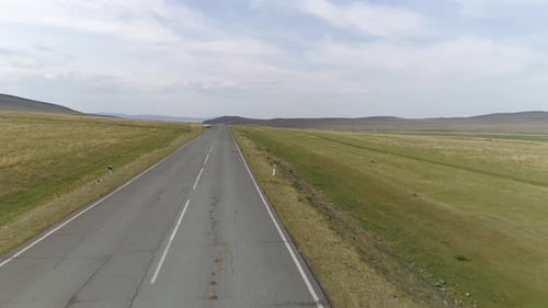 Flying over Road to Car