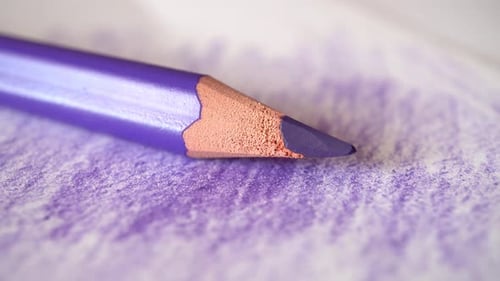 Color Pencil Lies On A Paper Stick