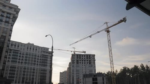 City Construction Site with Cranes and Buildings