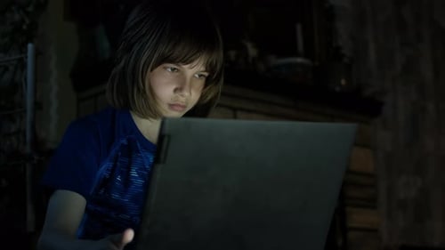 Close Up Shot of Little Boy on the Internet