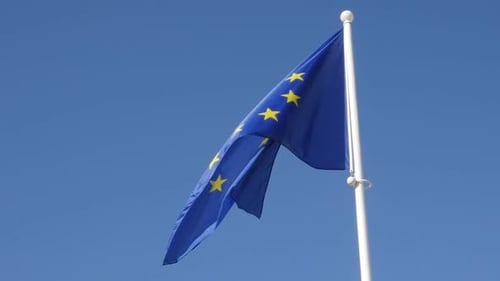 European Union Flag Waving Against Blue Sky