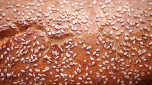 Fresh Bread Loaf with Sesame Seeds Close Up