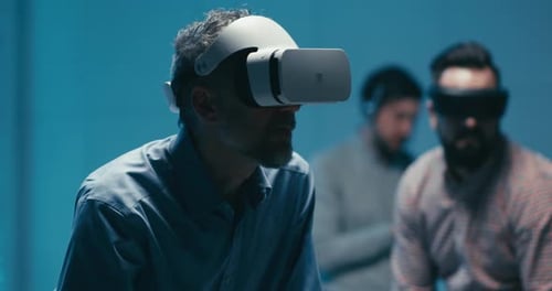 Engineers Using VR Glasses in Office