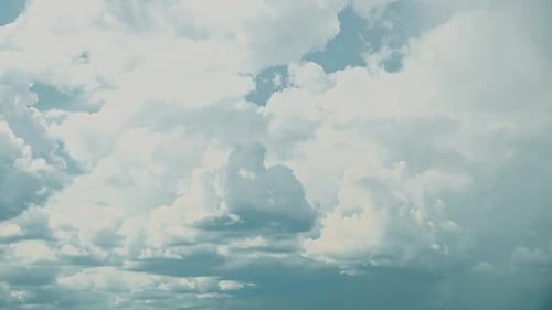 Billowing Cumulus Clouds Across an Expansive Sky