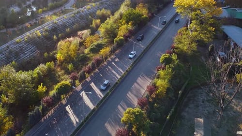 Cars On The Highway At The Sunset Light