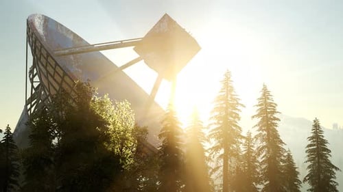 Le radiotélescope de l'Observatoire en forêt au coucher du soleil