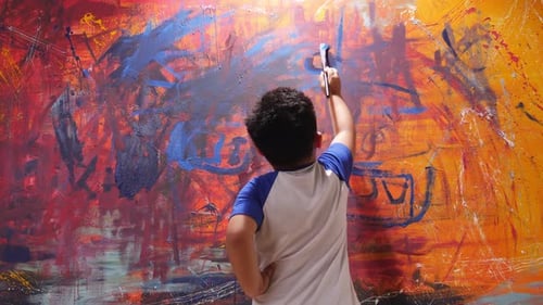 Child Painting Abstract Art at Home, Back View