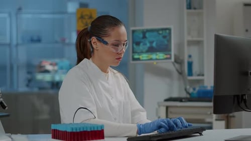 Portrait of Researcher Working on Computer in Science Laboratory