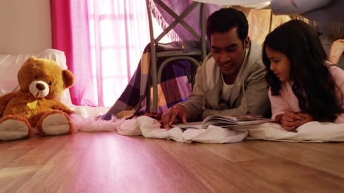 Cozy Family Reading in a Blanket Fort