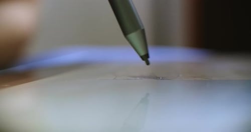 Stylus Drawing on Tablet Display Close Up