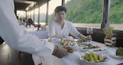 Waiter Taking Table Order