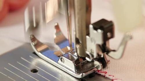 Sewing Machine Close Up Stitches Red Thread