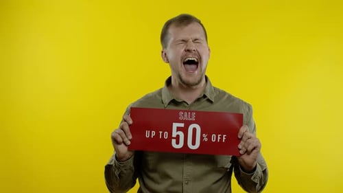 Excited Man Promoting a Big Sale