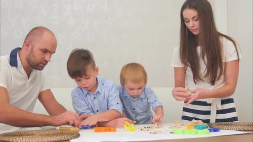 Family Enjoys Arts and Crafts Time Together at Home