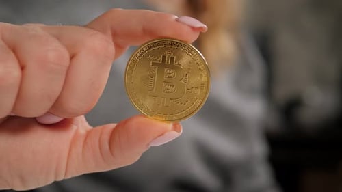 Close up of Bitcoin in Hand