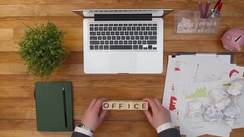 From Wooden Cubes the Word Office on Desktop is Composed