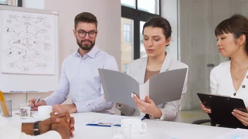 Applicant Interviewed by Three Business Professionals in Office