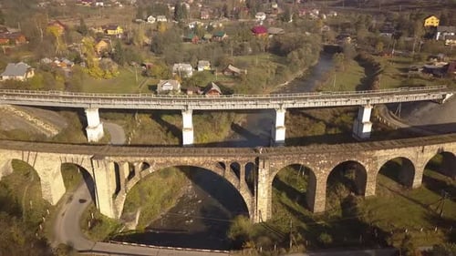 Aerial view of an old ruined train bridge in town of Vorokhta in Carpathian mountains, Ukraine