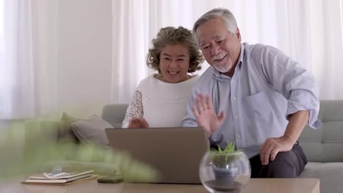 Senior Couple Enjoying Video Call at Home