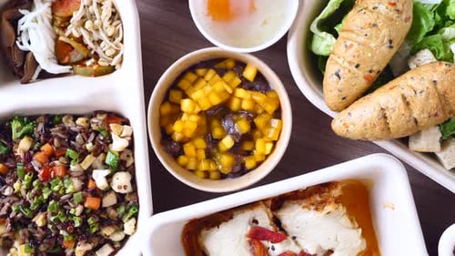 Various containers of healthy balanced takeout meal