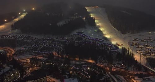 Night Illumination Cityscape Center Square Mountain Popular Ski Resort. Details of Modern House